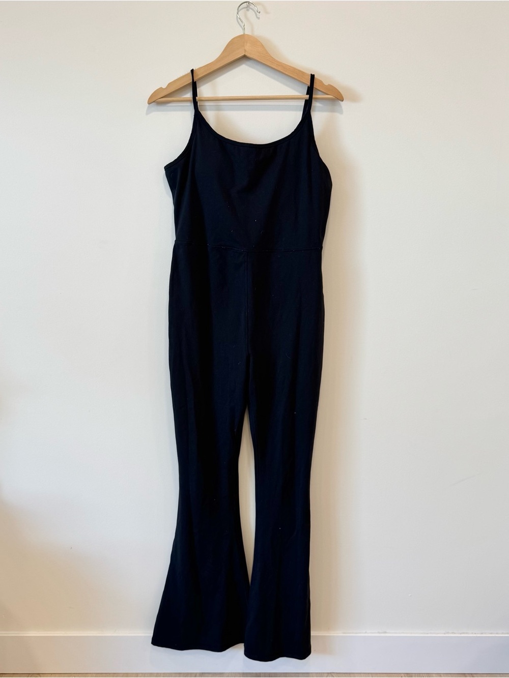 Gap Black jumpsuit with flared legs + built in bra padding.